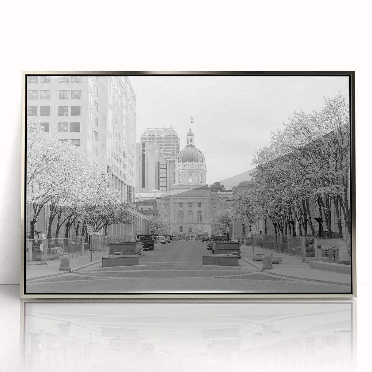 Mid-century modernist art of Indianapolis skyline in muted silver and gray tones on framed acrylic.