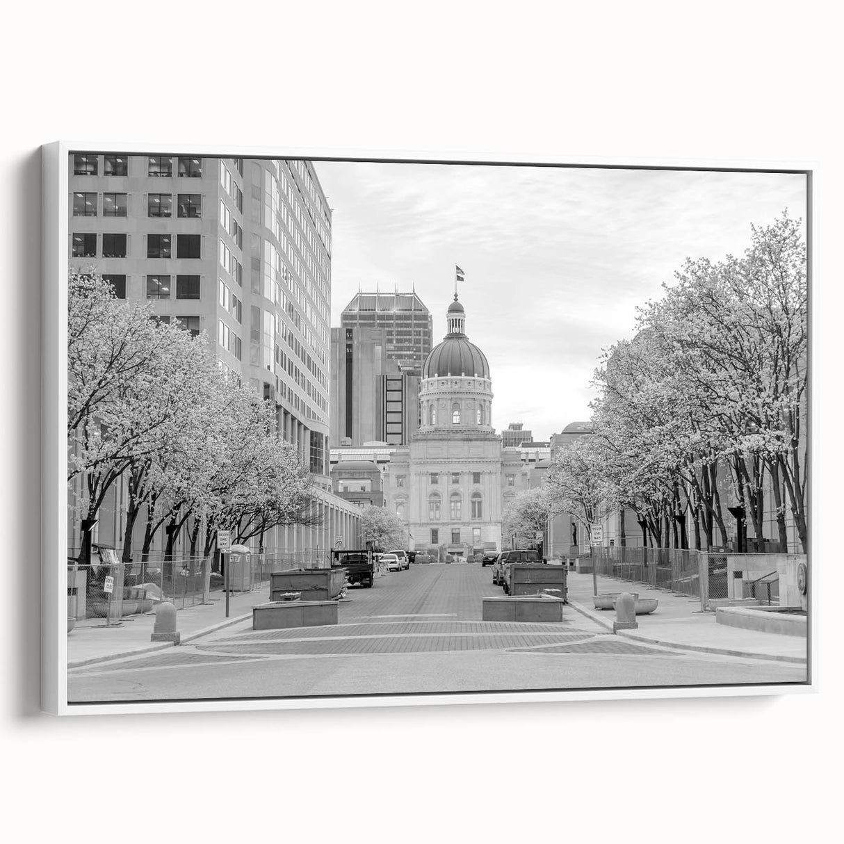 Vintage poster art of Indianapolis skyline in colorful hues on a framed canvas, suitable for living room decor.