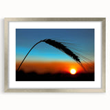 Textured abstract art print of Kansas scenery in muted earth tones, framed with a silver mat, suitable for bedroom decor.