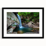 Abstract art print of a colorful Kentucky landscape in vibrant hues on a black framed canvas, ideal for living room decor.