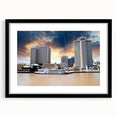 Extra large wall art featuring an abstract depiction of New Orleans in vibrant, colorful textures on a framed black mat.