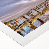 Art deco poster of Annapolis skyline in muted blue tones on rolled canvas, suitable for dining room wall art.