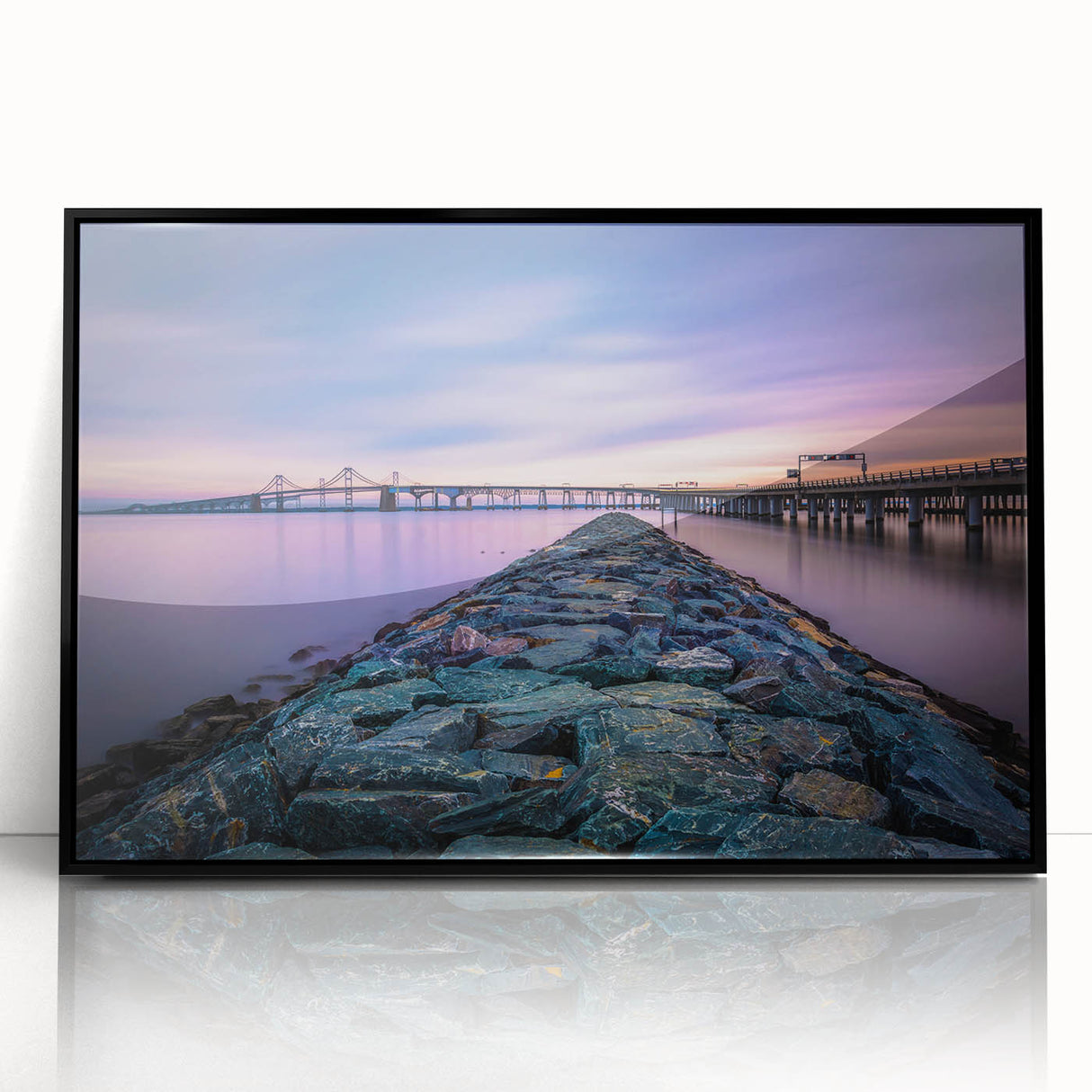 Large abstract wall art depicting Chesapeake Bay in muted blue tones, framed in black acrylic.