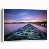 Vintage poster art of Chesapeake Bay on a framed canvas, featuring a black and colorful palette.