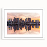 Abstract art print of Boston skyline in muted blue and gray tones on a white framed canvas, ideal for dining room decor.