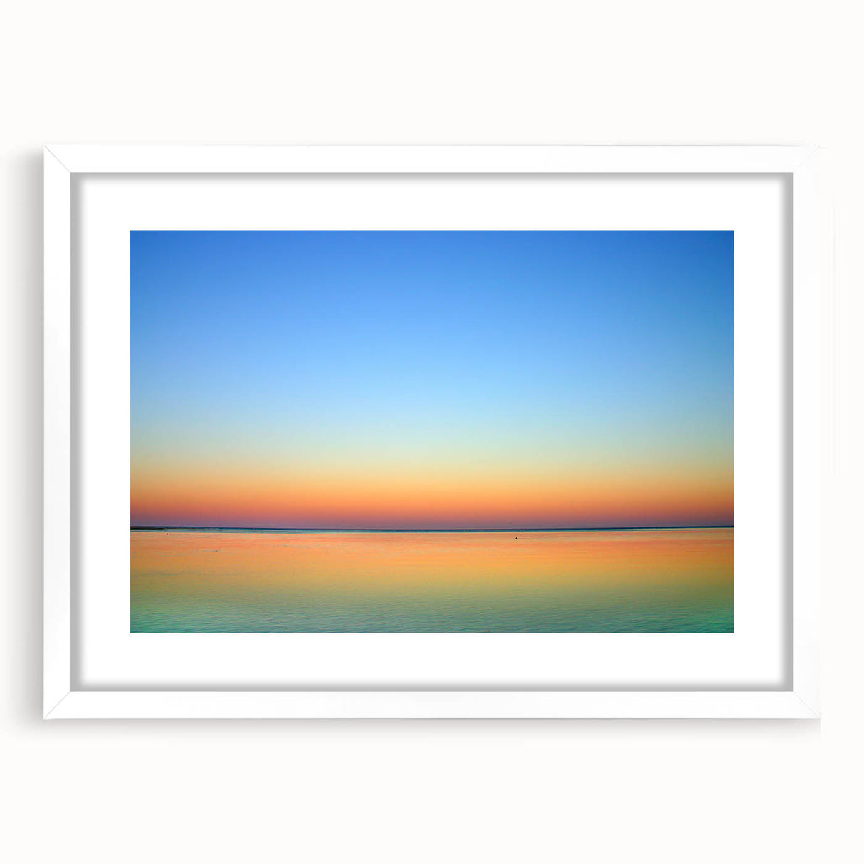 Abstract art print of Massachusetts Cape scenery in muted blue and green tones, framed with a white mat.