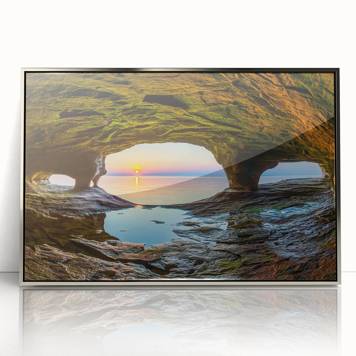 Mid-century modernist art depicting Michigan's Upper Peninsula in muted earth tones on a silver-framed acrylic print.