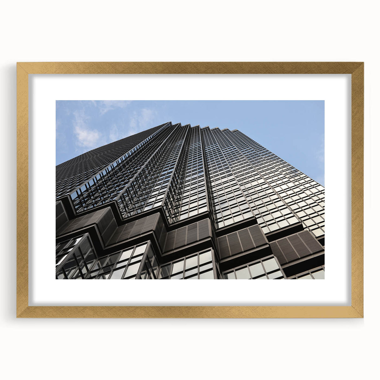 Extra large abstract art print of Minneapolis skyline in textured gold frame, suited for living room decor.