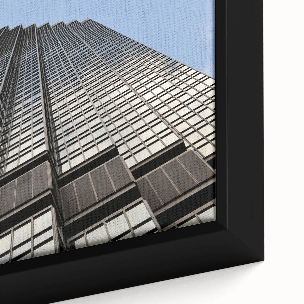 Close-up of extra large black wall art featuring a textured Minneapolis skyline in vibrant colors on framed canvas.