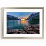 Textured art depicting abstract Montana Glacier scenery in muted earth tones on a framed silver mat.