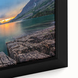 Close-up of textured black wall art depicting Montana's Glacier scenery on a framed canvas, with colorful art accents.