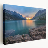 Panoramic view of Glacier National Park on a large stretched canvas, featuring serene blue and green tones.