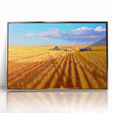 Mid-century modernist art depicting a serene Montana landscape in muted earth tones on a silver-framed acrylic print.