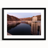 Abstract art print of Hoover Dam in vibrant colors on a large framed canvas, suitable for living room decor.