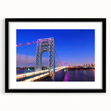 Abstract art print featuring textured, colorful strokes on a large canvas, framed in black, suitable for living room decor.