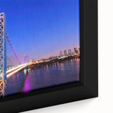 Close-up of a framed canvas featuring a textured depiction of a New Jersey scenery in black with vibrant color accents.