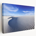 A panoramic wall art on stretched canvas depicting the White Sands in New Mexico, in soft white and blue tones.