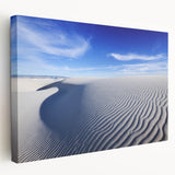 A panoramic wall art on stretched canvas depicting the White Sands in New Mexico, in soft white and blue tones.