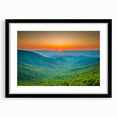 Colorful abstract art print of the Blue Ridge in muted blue and green tones, framed in black, ideal for living room decor.