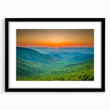 Colorful abstract art print of the Blue Ridge in muted blue and green tones, framed in black, ideal for living room decor.