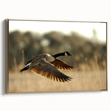Framed canvas of Cape Hatteras landscape in muted gold and black tones, suitable as wall art for bedroom.