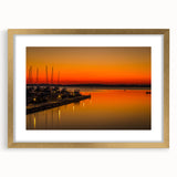 Extra large wall art of abstract Charlotte skyline in textured gold frame, in muted blues and grays.