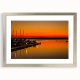 Textured art print of Charlotte skyline in muted gray and blue tones on a framed silver mat.