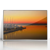 Acrylic print of Charlotte skyline in muted gray and blue tones, framed in white, suitable for modern art wall decor.