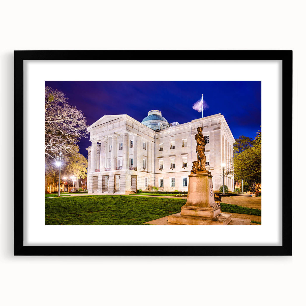 Abstract art print of Raleigh skyline in vibrant colors on a large, framed canvas, ideal for living room decor.