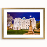 Extra large textured abstract art print of Raleigh skyline in muted earth tones on a framed canvas.