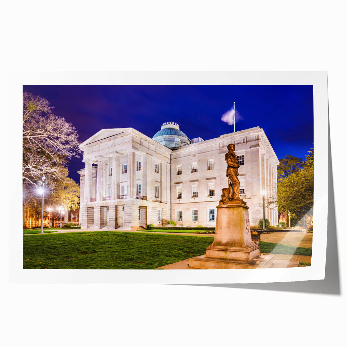 Raleigh cityscape in muted blue and gray tones on a large rolled canvas, suitable for dining room or bathroom wall art.