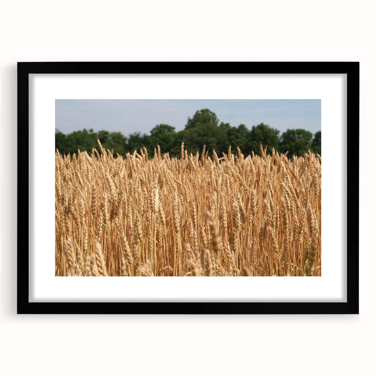 Abstract art print of a textured, colorful North Dakota scenery in a black frame, ideal for large living room walls.