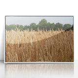 Acrylic print of North Dakota scenery in art deco style, with muted earth tones, framed in white.