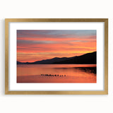 Extra large wall art featuring an abstract depiction of the Adirondacks in textured hues of blue and green, framed in gold.