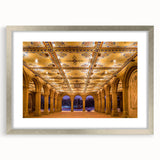 Textured art print of Central Park with abstract elements in green and brown tones, framed in silver.