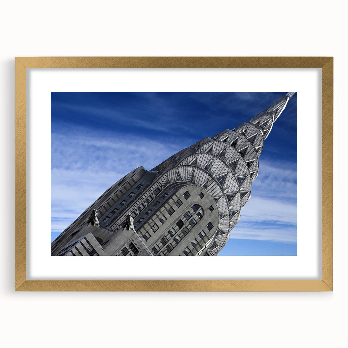 Extra large abstract art print of the Chrysler Building in textured gold and black tones on a framed canvas.