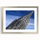 Textured art print of the Chrysler Building in abstract style, matte silver frame, suited for bedroom decor.