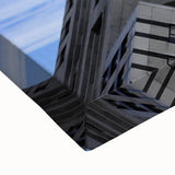 Close-up of a large art piece depicting the Chrysler Building in black and white on stretched canvas.