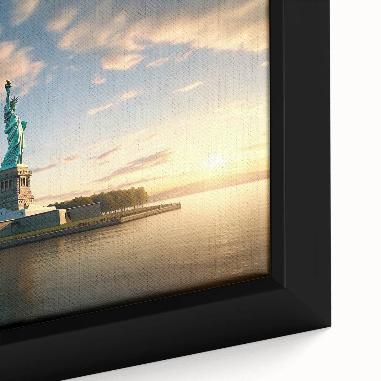 Close-up of a black framed canvas featuring a textured depiction of Ellis Island with colorful art accents.