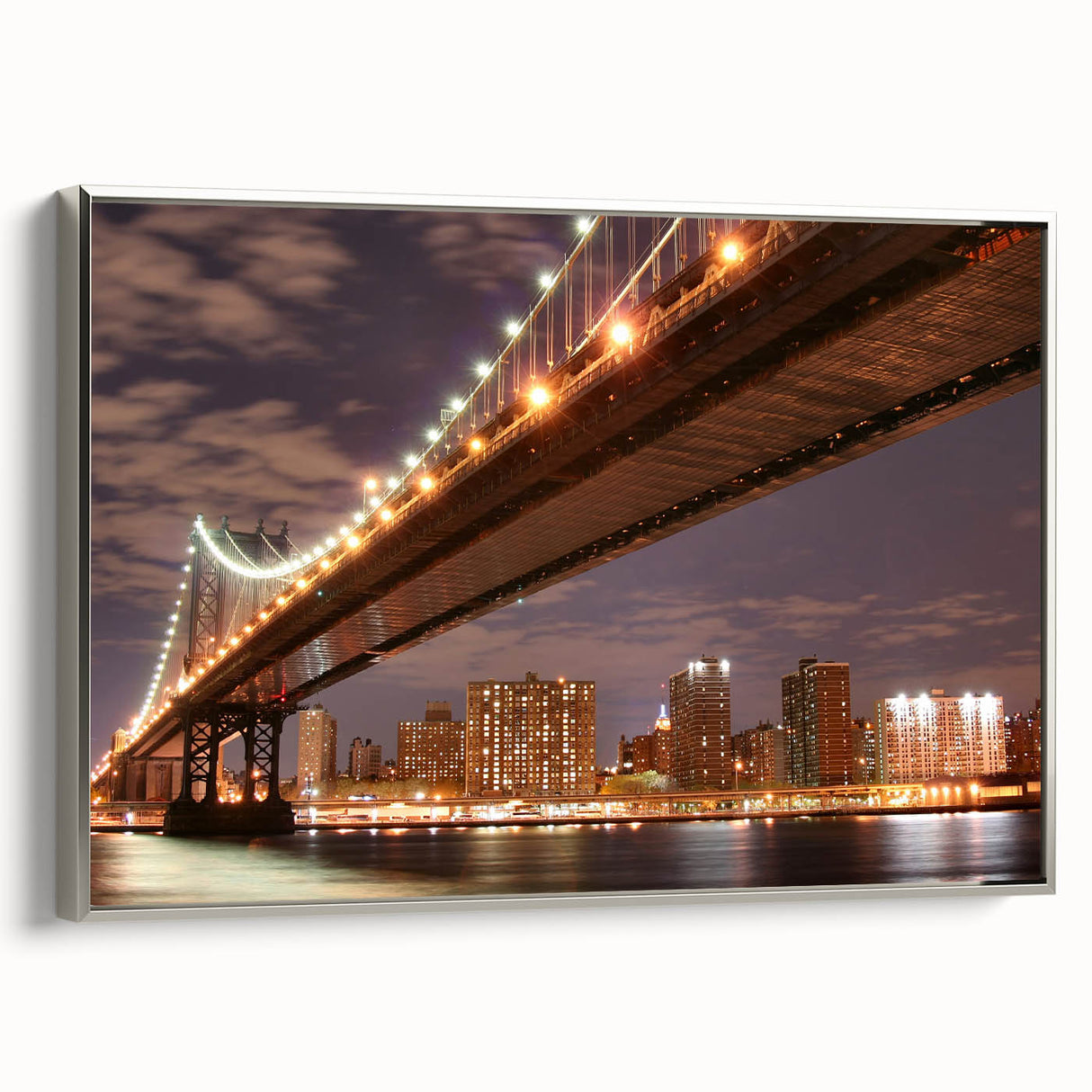Framed canvas of Manhattan Bridge in muted black and silver tones, ideal for modern living room decor.