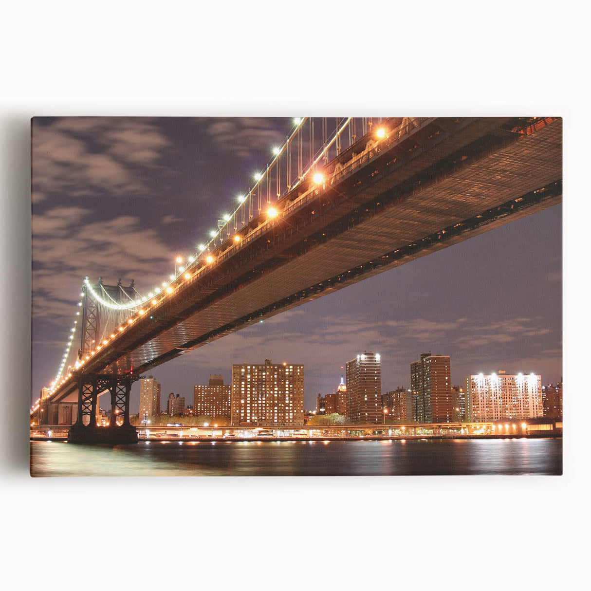 Large art print of the Manhattan Bridge in muted gray and blue tones on stretched canvas, ideal for kitchen wall art.