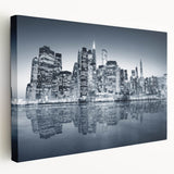 Large art print of Manhattan skyline in muted gray and blue tones on stretched canvas, ideal for kitchen wall art.