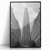 Large abstract wall art of NYC skyline in black and white tones on framed acrylic, suitable for modern living room decor.