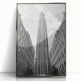Mid-century modernist art depicting New York City skyline in muted silver tones, acrylic print in silver frame.