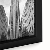 Framed canvas depicting a textured scene of NYC from Rockefeller, with a black and colorful art palette.