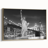 Framed canvas wall art of the Statue of Liberty in monochrome tones, ideal for bedroom decor.