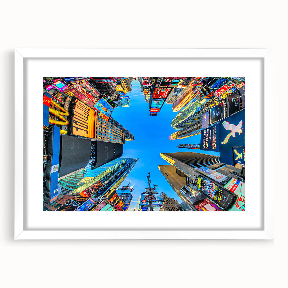 Abstract art print of Times Square with vibrant colors on a framed white mat, ideal for dining room decor.