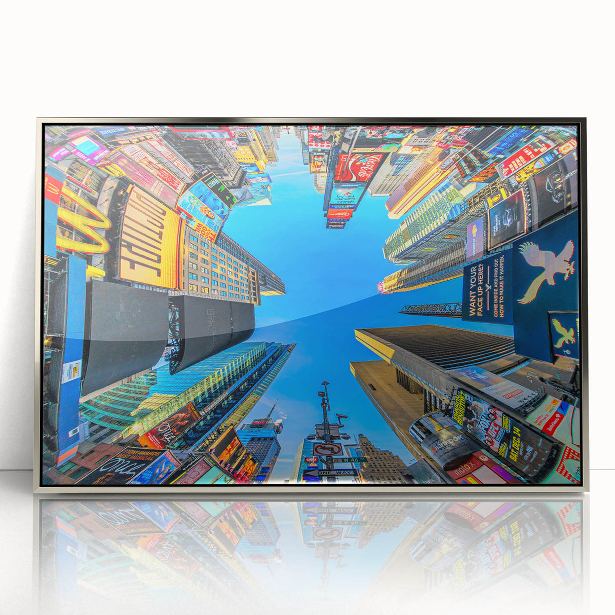 Mid-century modernist art of Times Square in vibrant colors on a silver-framed acrylic print.