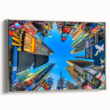 Framed canvas of a colorful Times Square landscape with vintage poster art elements, ideal for living room decor.