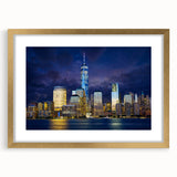 Extra large abstract art print of NYC skyline in textured style, with muted gold and blue tones on a framed canvas.